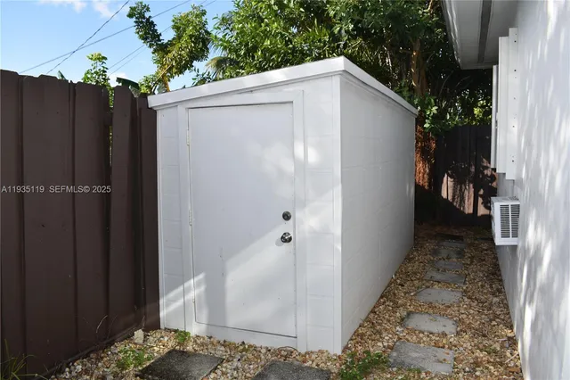 a view of a house with a wooden door