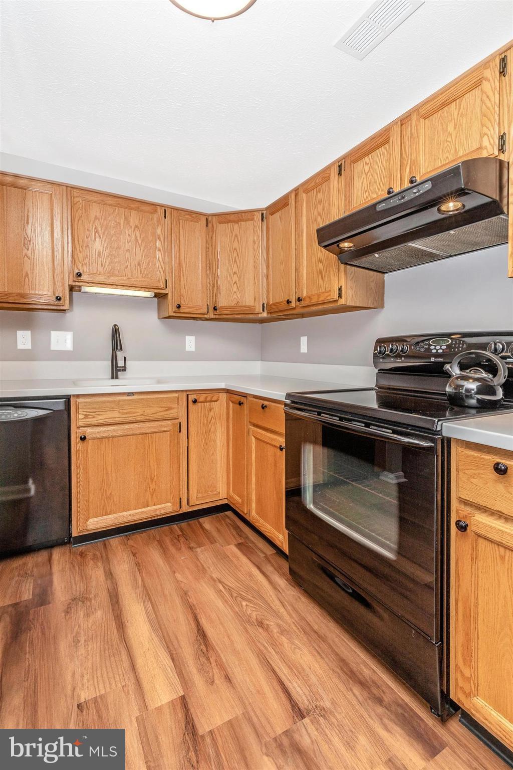 2102 Whitehall Road, Unit BA Frederick, MD 21702 - Photo 13 of 21 Kitchen w/ fresh paint & new floor