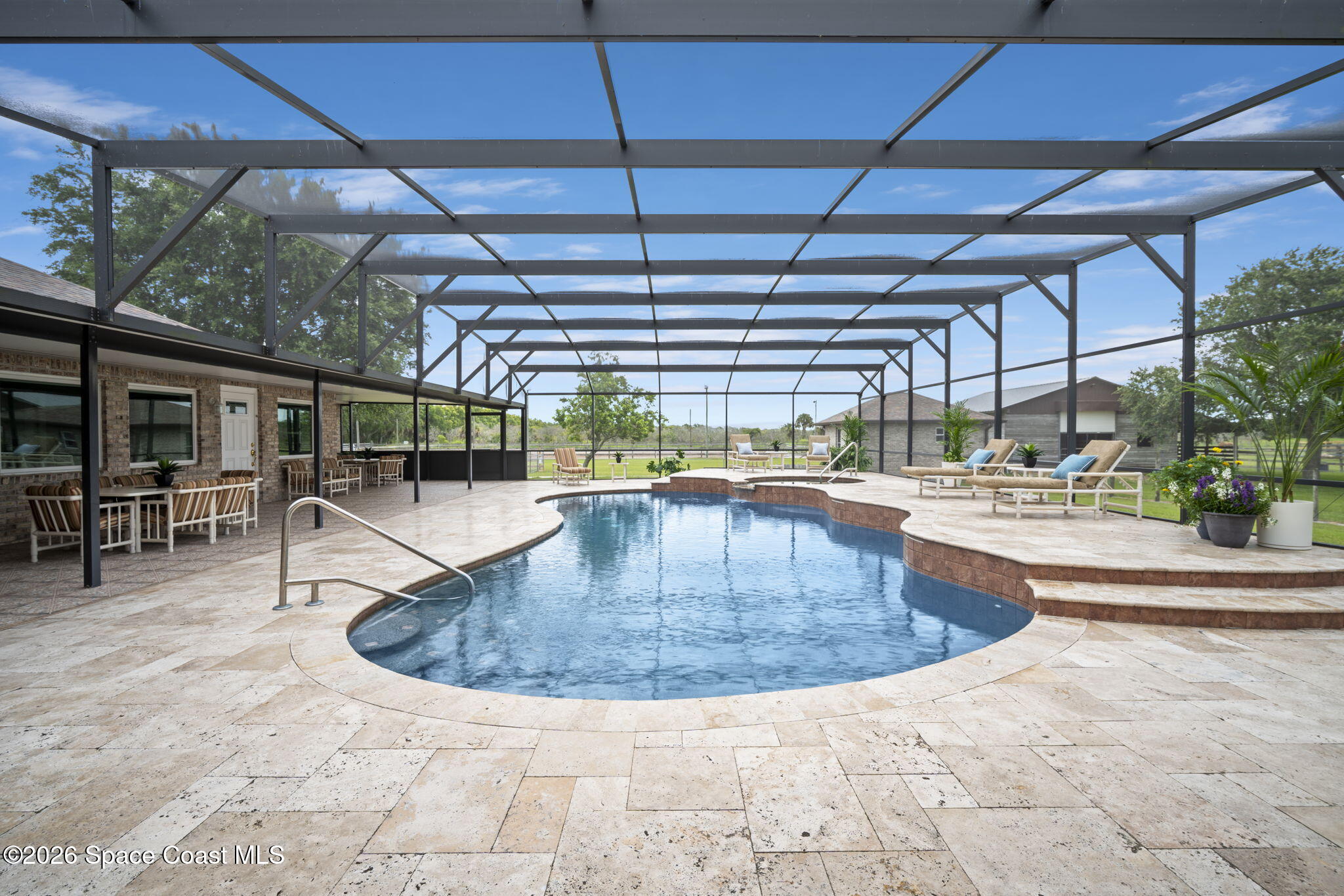 3125 Davis Road Mims, FL 32754 - Photo 41 of 47 a view of a swimming pool with a patio