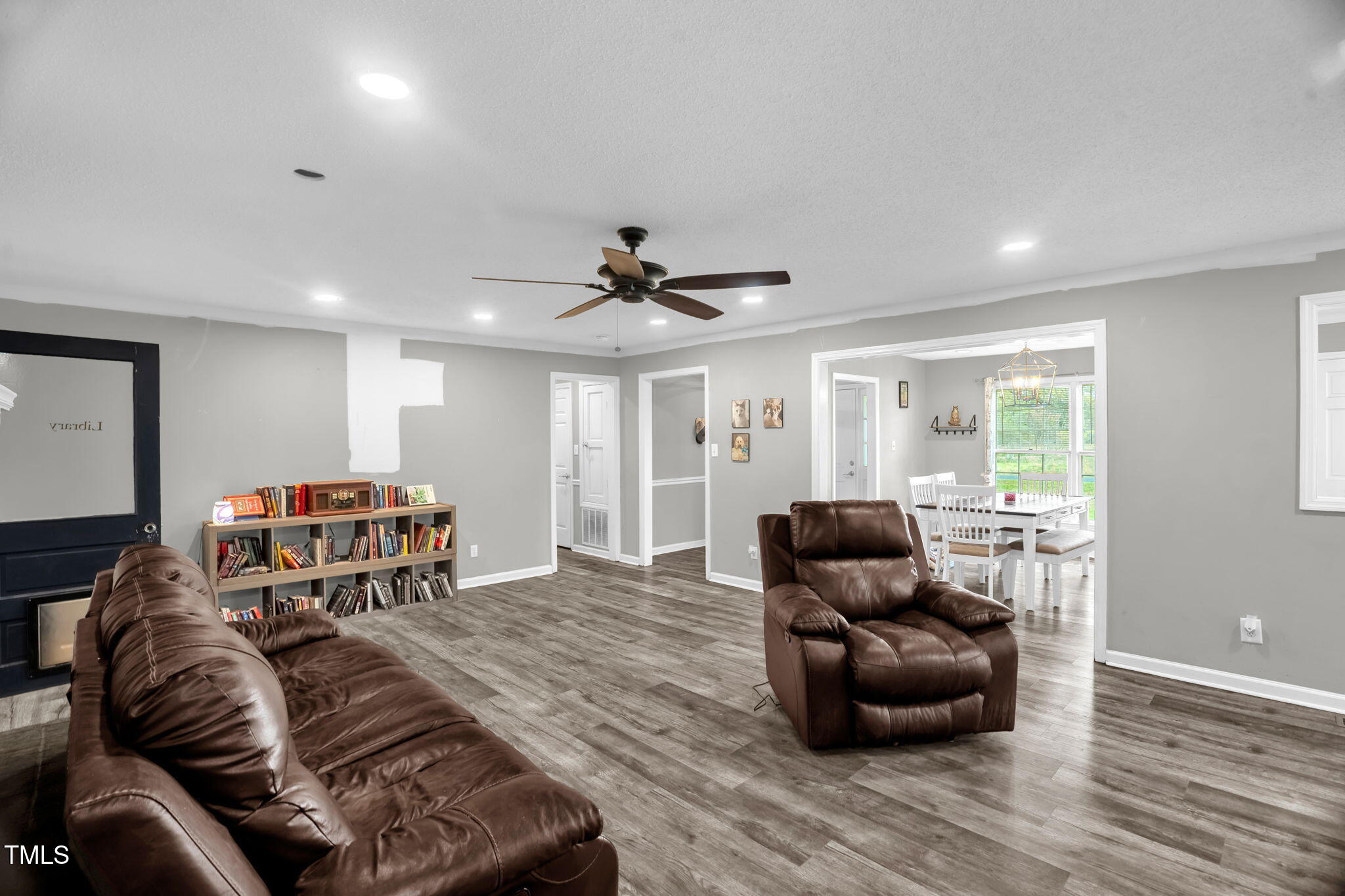 1022 Glover Road Dunn, NC 28334 - Photo 15 of 31 a living room with furniture and a couch
