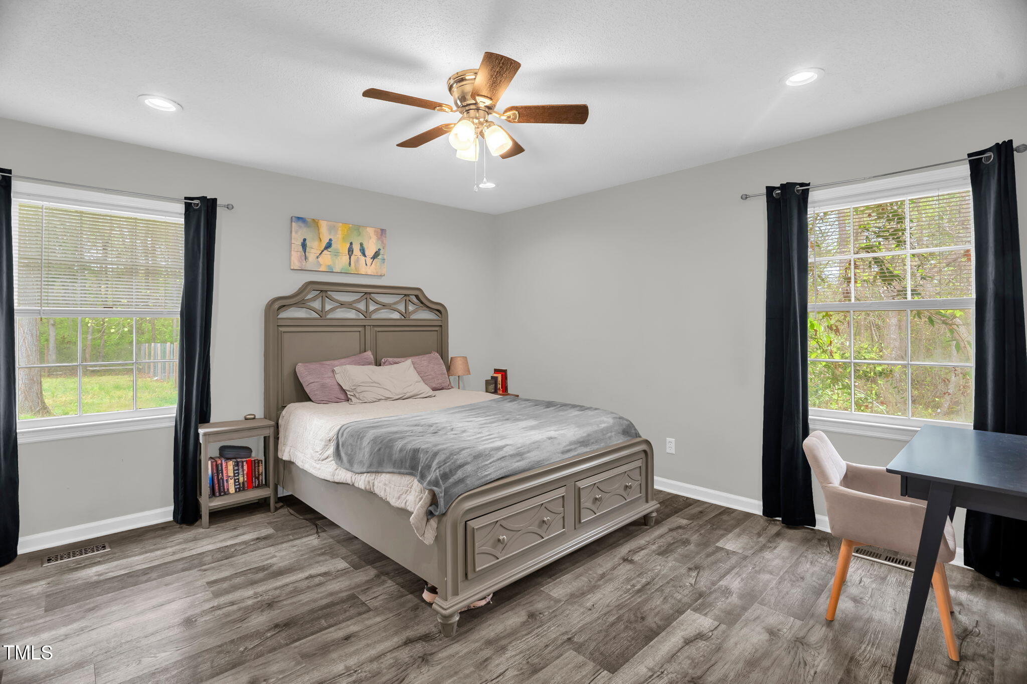 1022 Glover Road Dunn, NC 28334 - Photo 17 of 31 a bedroom with a bed and a window