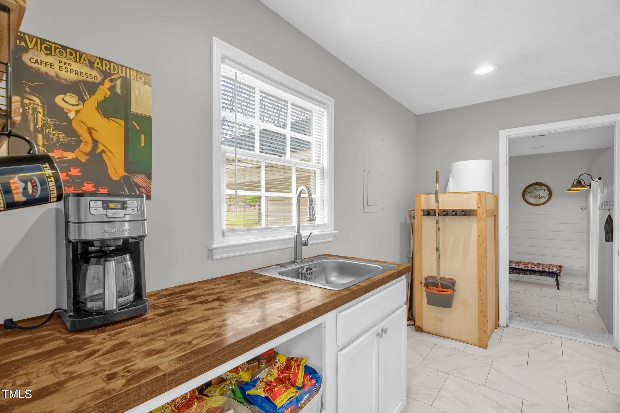 1022 Glover Road Dunn, NC 28334 - Photo 26 of 31 a kitchen with granite countertop a refrigerator and a stove