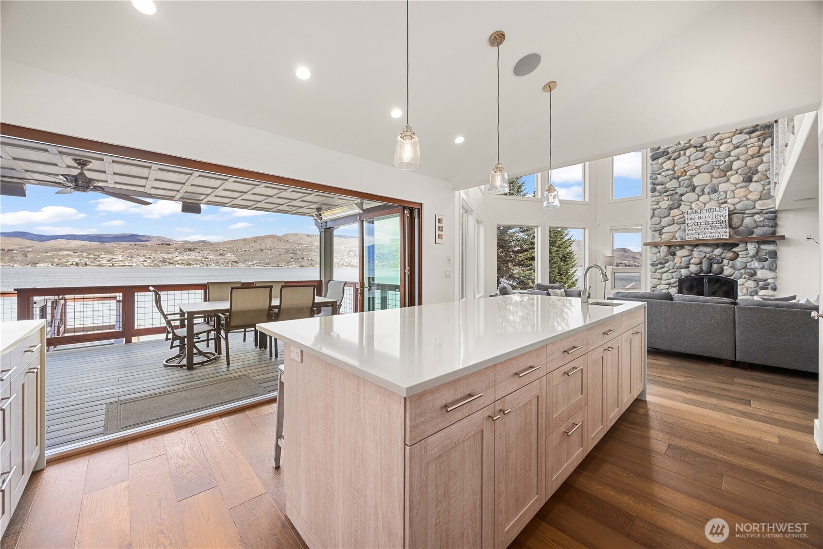 21 Grace Lane Chelan, WA 98816 - Photo 11 of 37 a large white kitchen with a large window