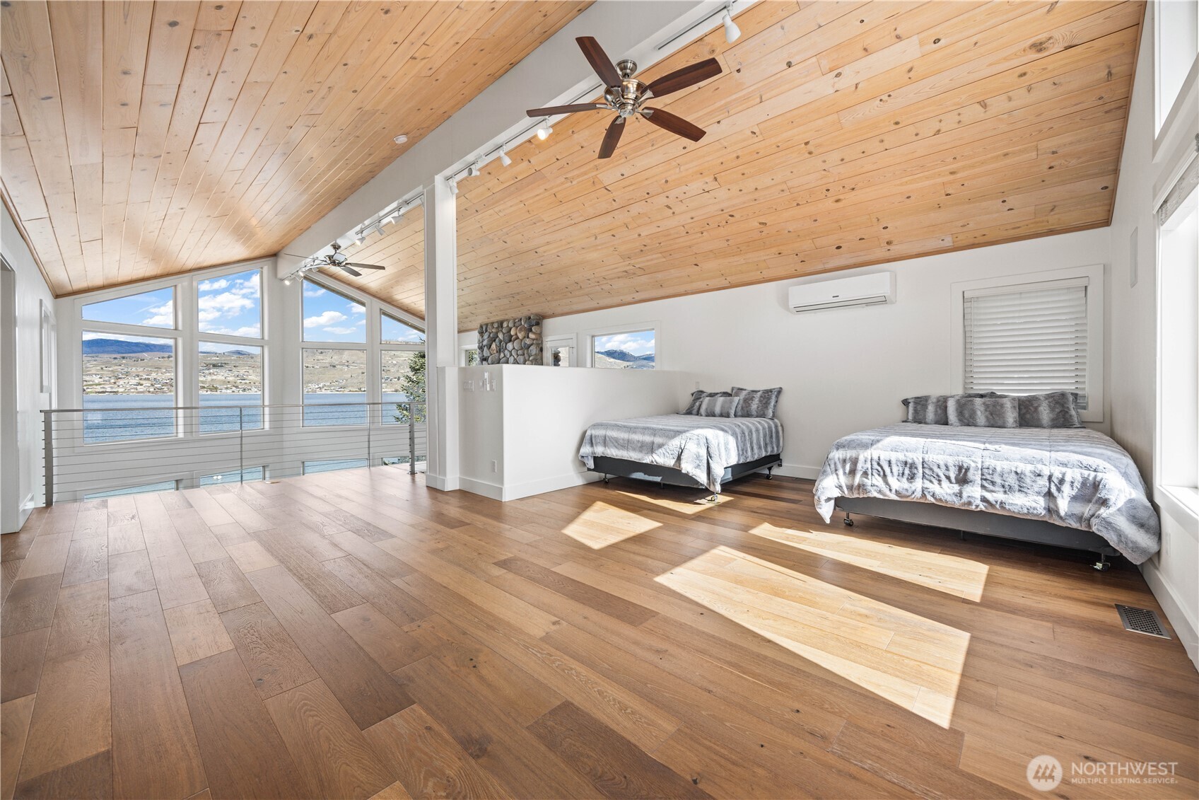 21 Grace Lane Chelan, WA 98816 - Photo 18 of 37 a bedroom with furniture and large window