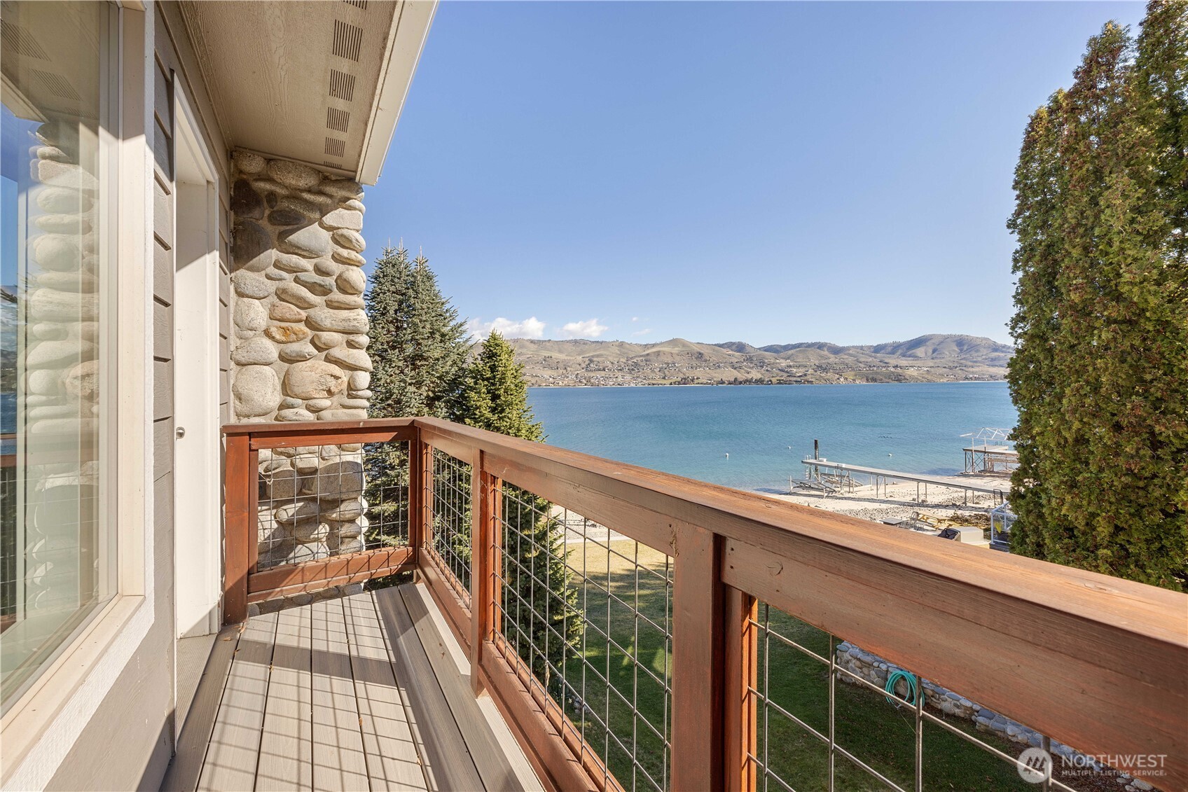 21 Grace Lane Chelan, WA 98816 - Photo 20 of 37 a view of balcony with wooden floor and fence
