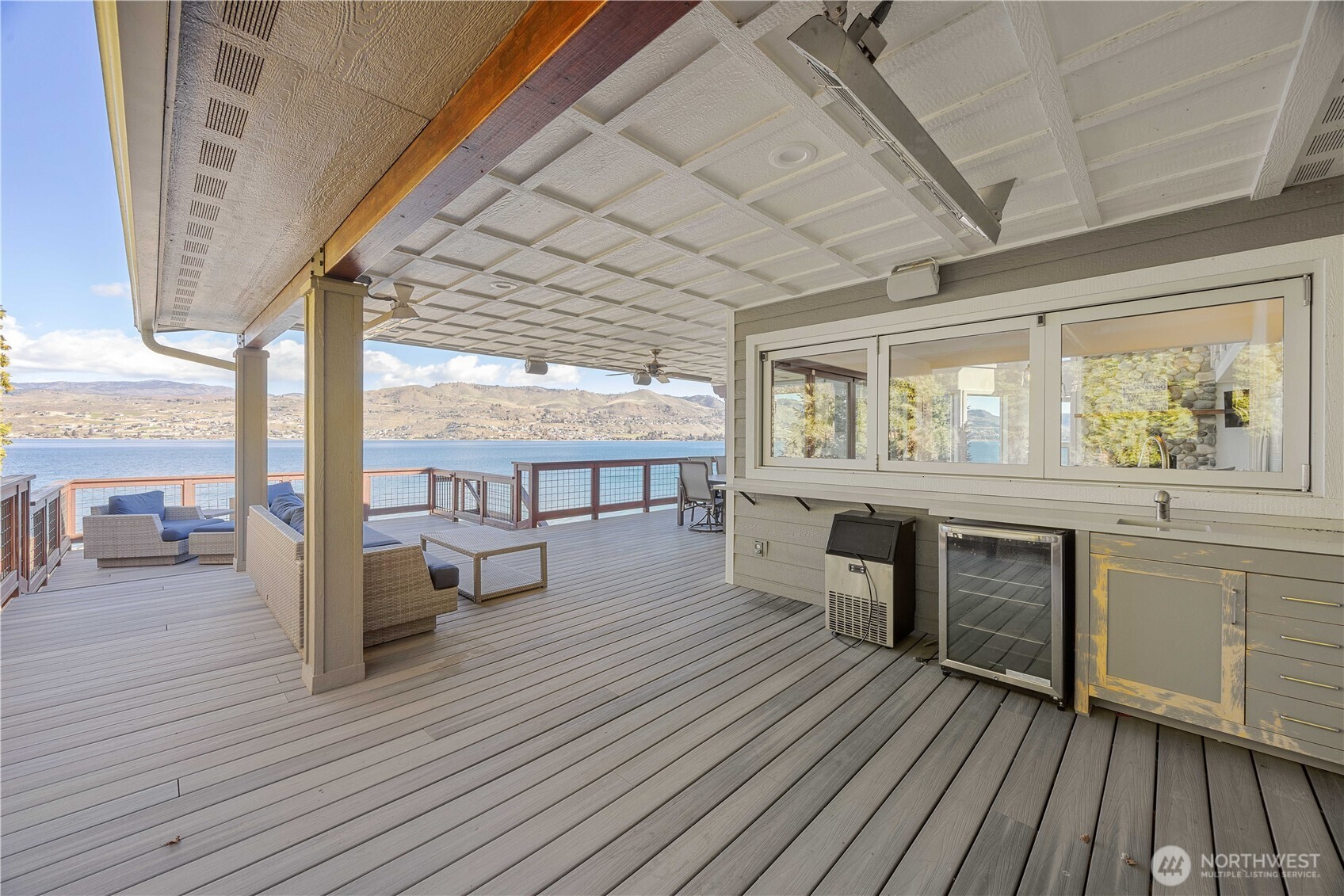 21 Grace Lane Chelan, WA 98816 - Photo 26 of 37 a view of a living room with wooden floor and fireplace