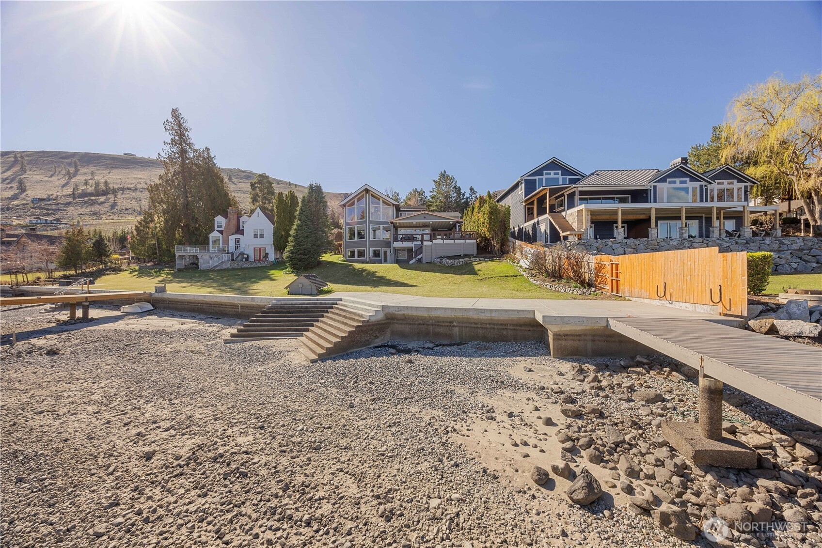 21 Grace Lane Chelan, WA 98816 - Photo 29 of 37 a view of a house with a yard and sitting area