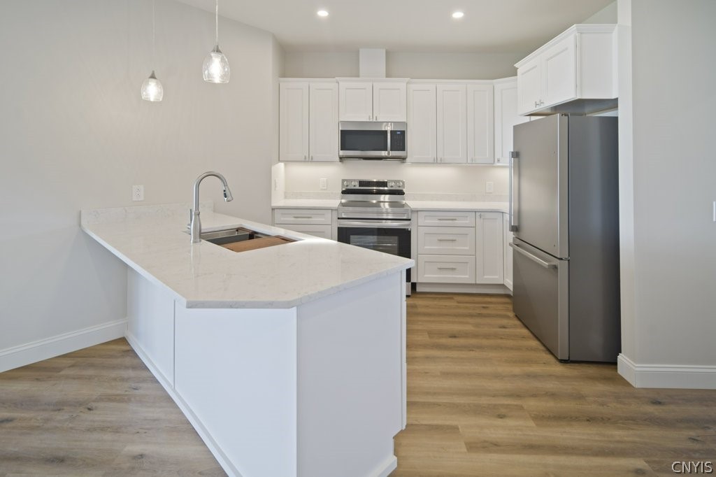 129 Oakcrest Road Lansing, NY 14850 - Photo 15 of 47 center unit peninsula