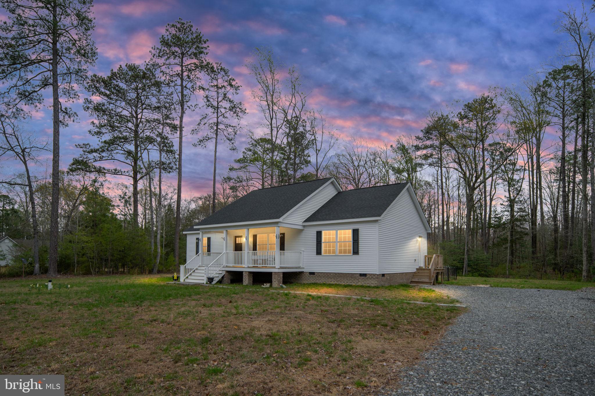 300 River Oaks Road Center Cross, VA 22437 - Photo 5 of 39 Charming home amid serene woods.