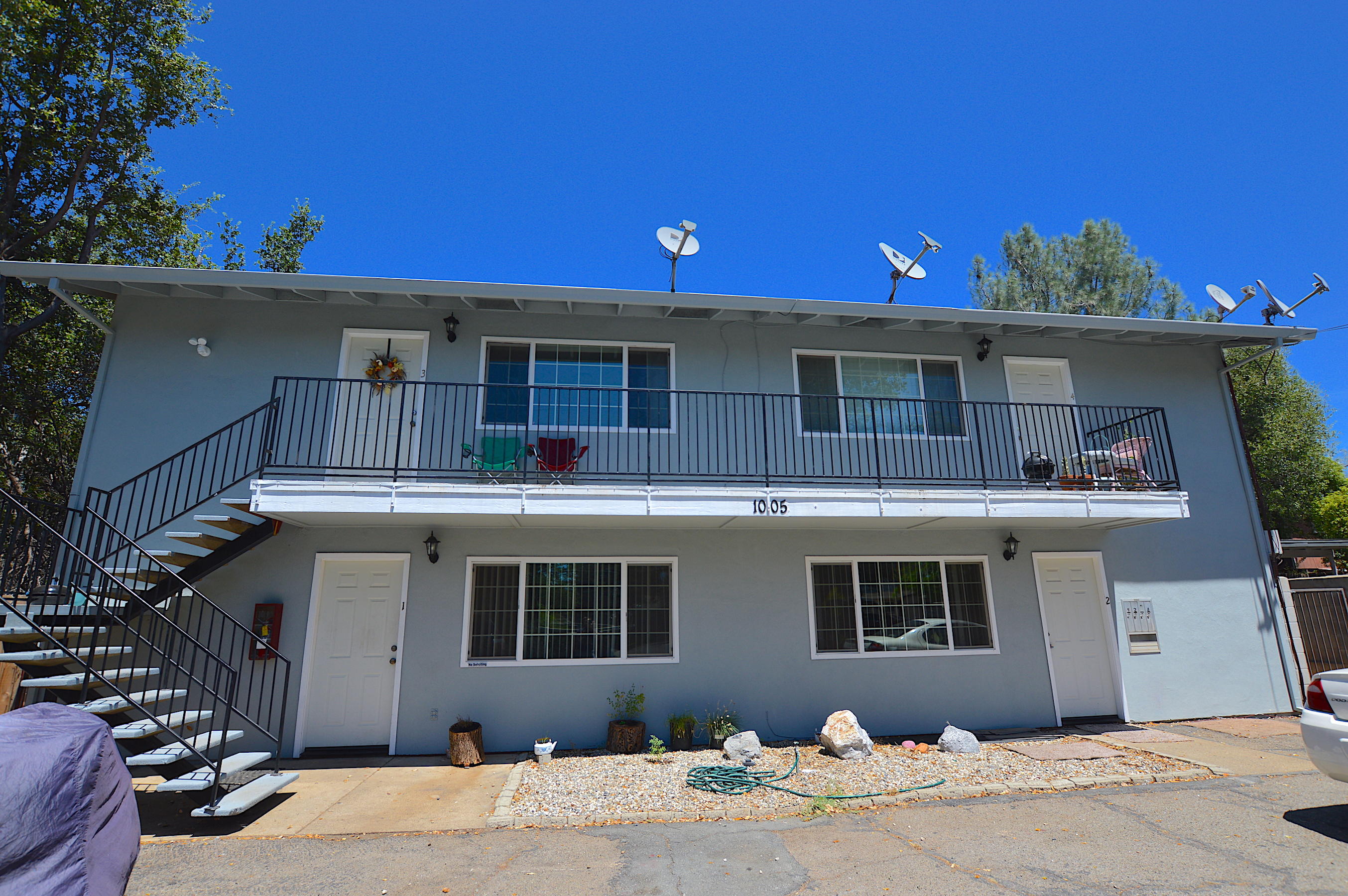 1005 Layton Road Redding, CA 96002 - Photo 1 of 17 a front view of a house with a garage