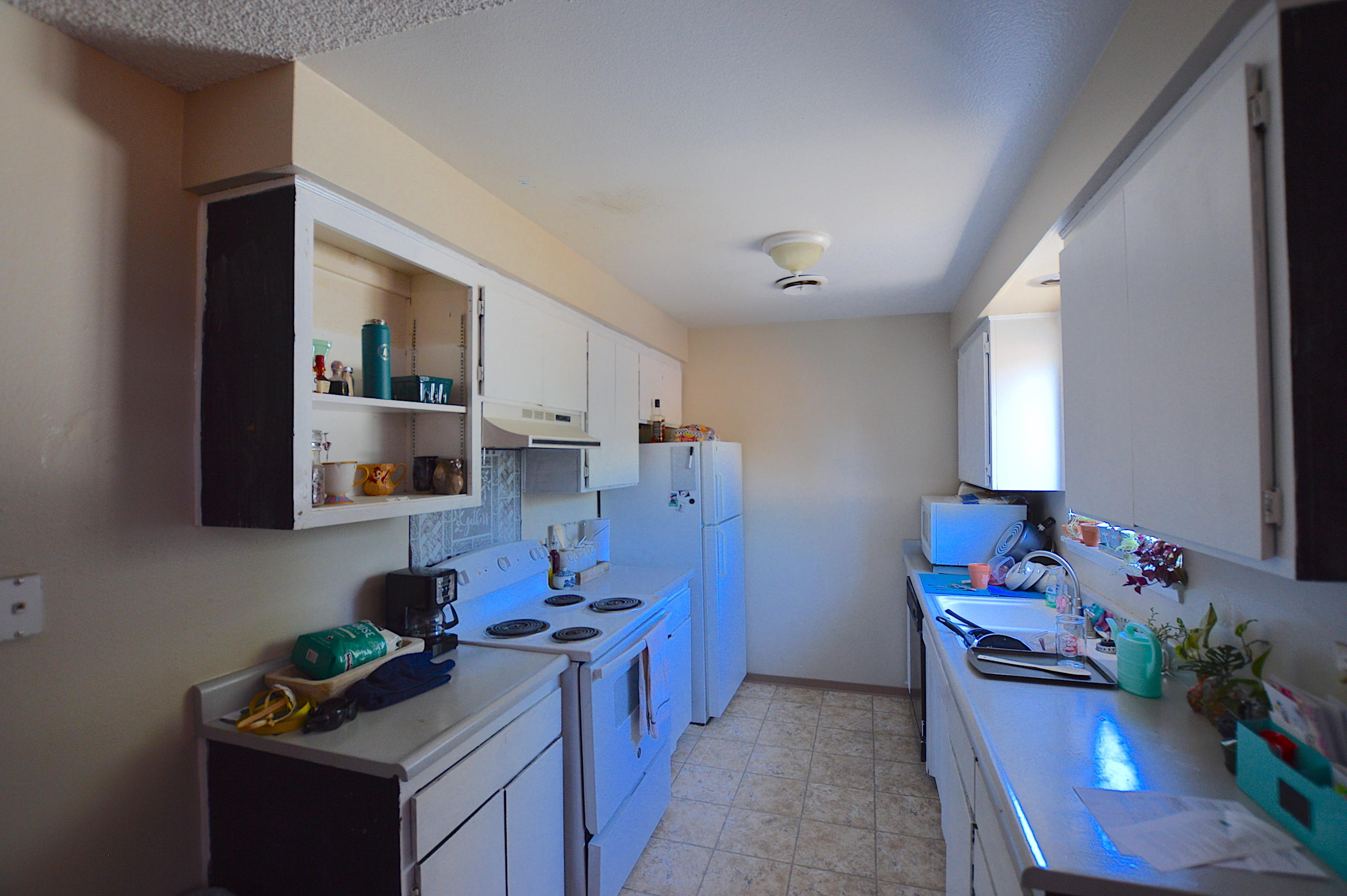 1005 Layton Road Redding, CA 96002 - Photo 14 of 17 a kitchen that has a sink and a stove in it