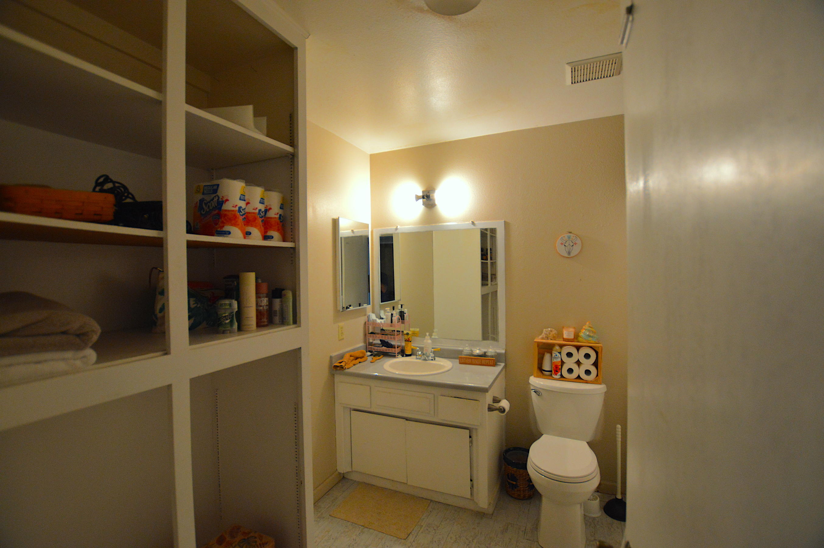 1005 Layton Road Redding, CA 96002 - Photo 16 of 17 a bathroom with a toilet sink and mirror