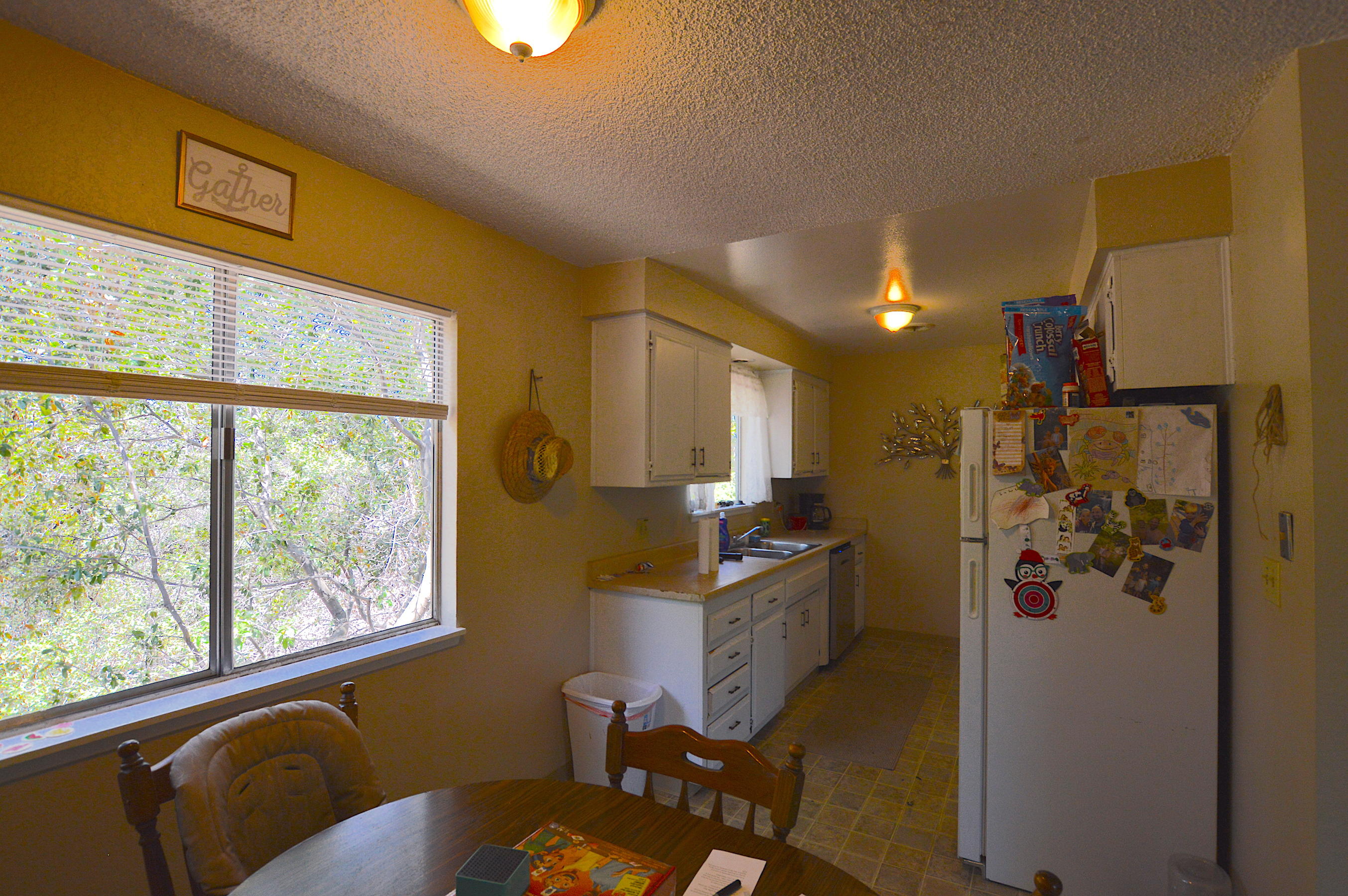 1005 Layton Road Redding, CA 96002 - Photo 5 of 17 a living room with furniture and a window