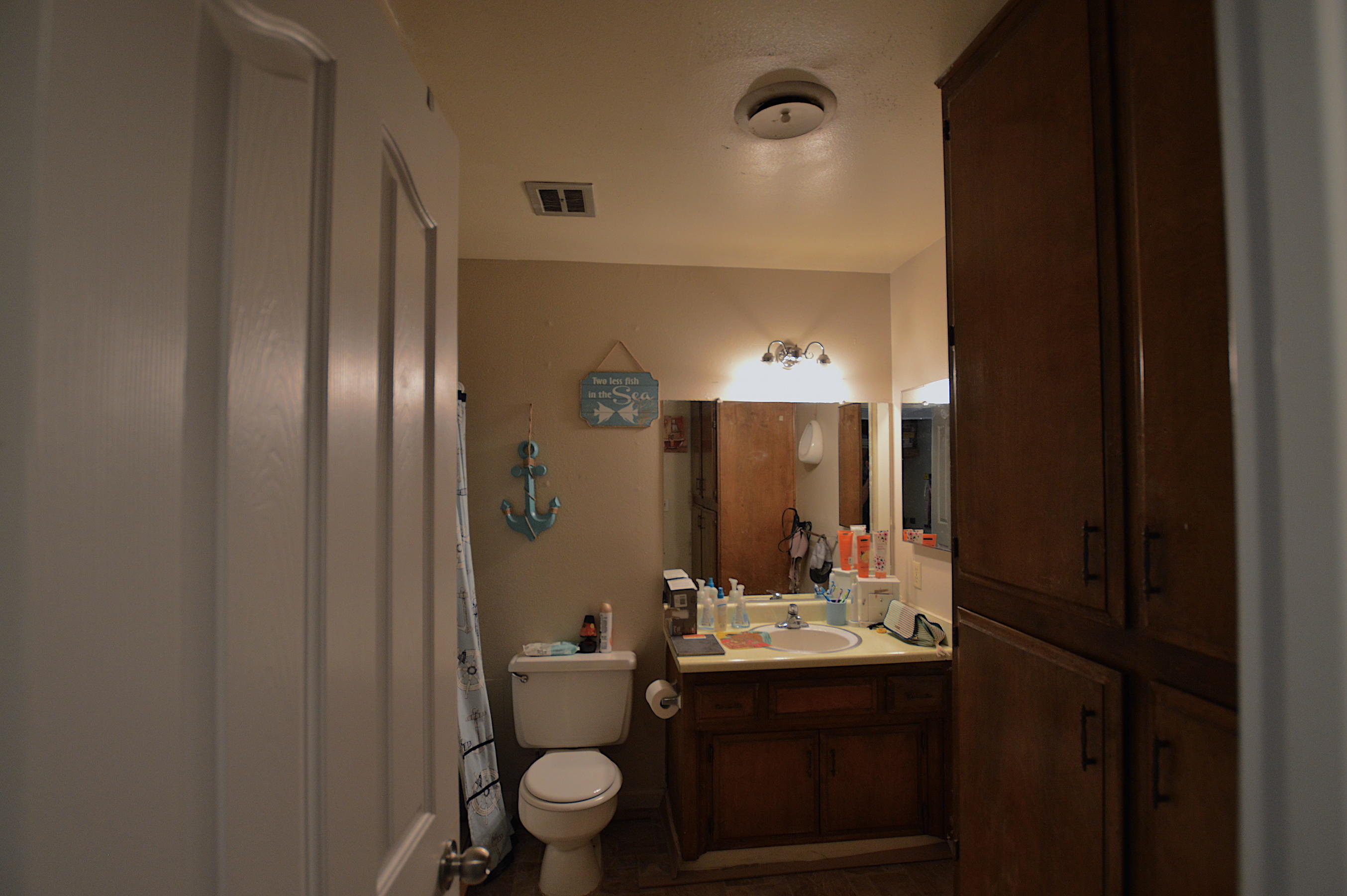 1005 Layton Road Redding, CA 96002 - Photo 7 of 17 a bathroom with a sink a toilet and shower