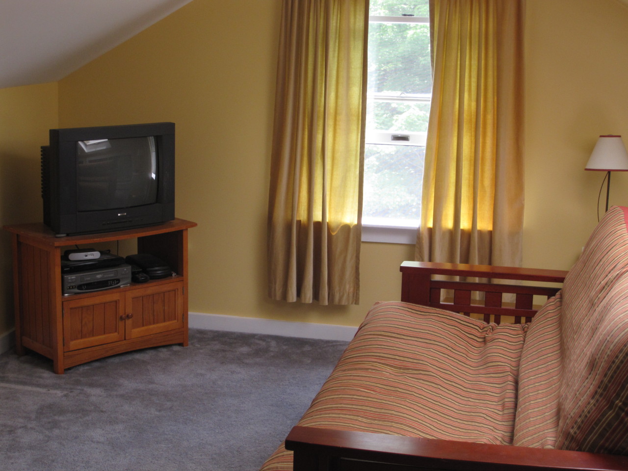 614 W Road Richmond, MA 01254 - Photo 16 of 19 a bedroom with a bed and a television