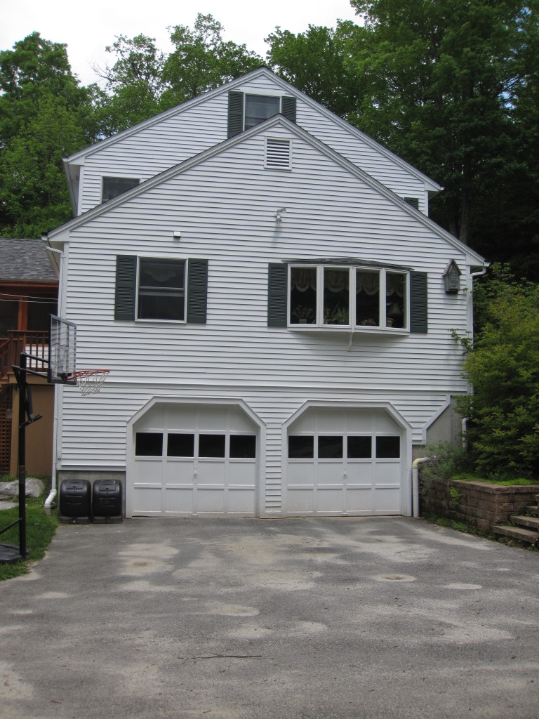 614 W Road Richmond, MA 01254 - Photo 3 of 19 a big house with a large window and large tree