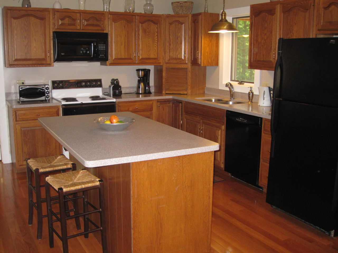 614 W Road Richmond, MA 01254 - Photo 5 of 19 a kitchen with a sink a stove a refrigerator and cabinets