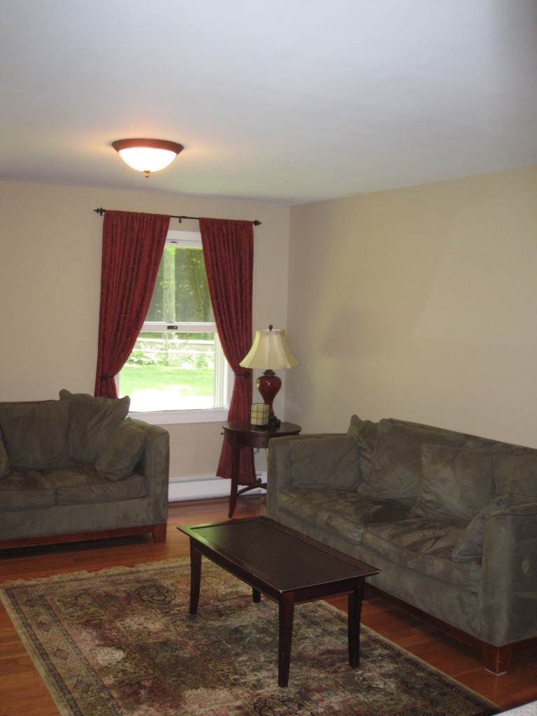 614 W Road Richmond, MA 01254 - Photo 6 of 19 a living room with furniture and a window