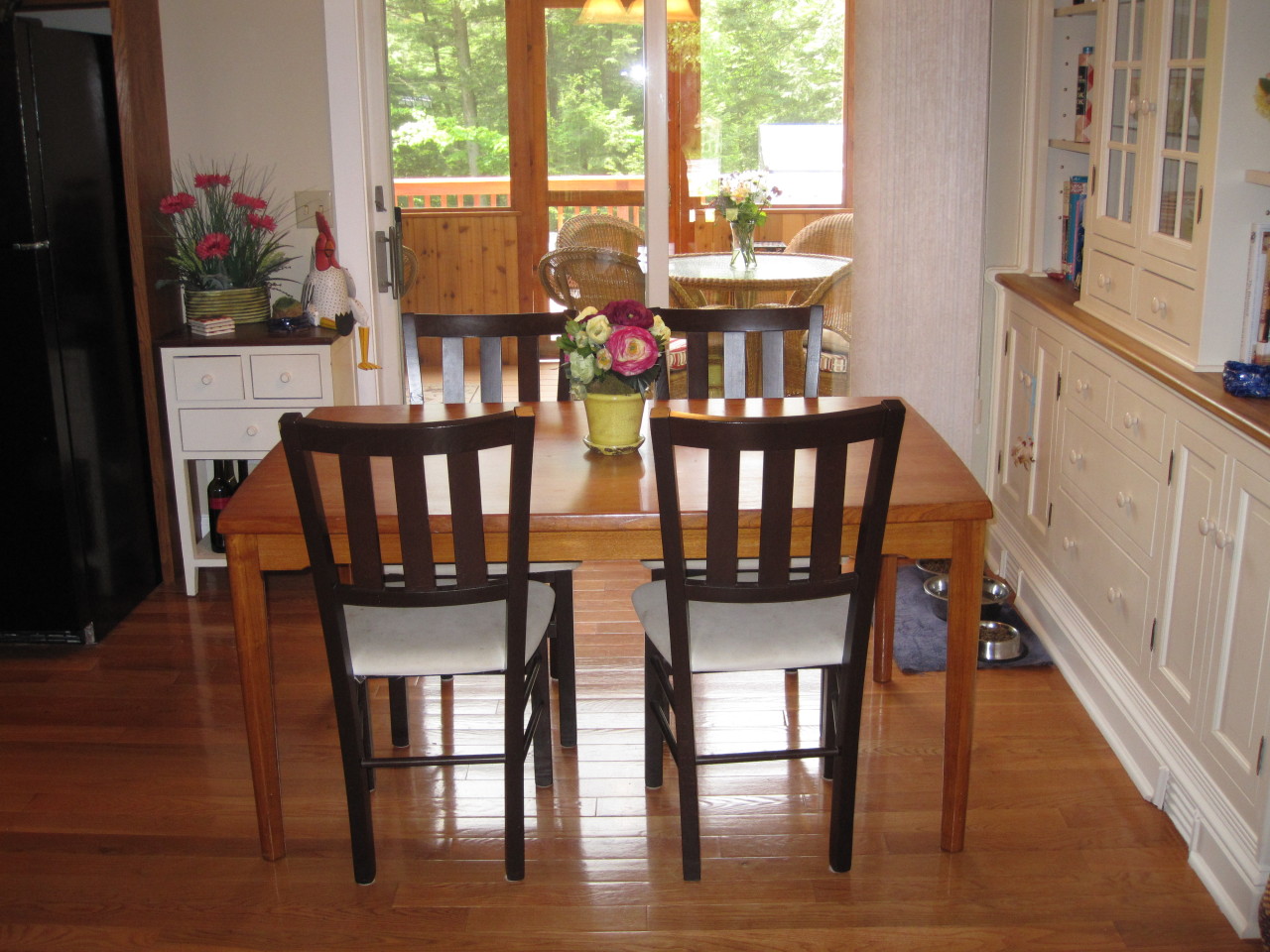 614 W Road Richmond, MA 01254 - Photo 8 of 19 a view of a dining room with furniture and a window