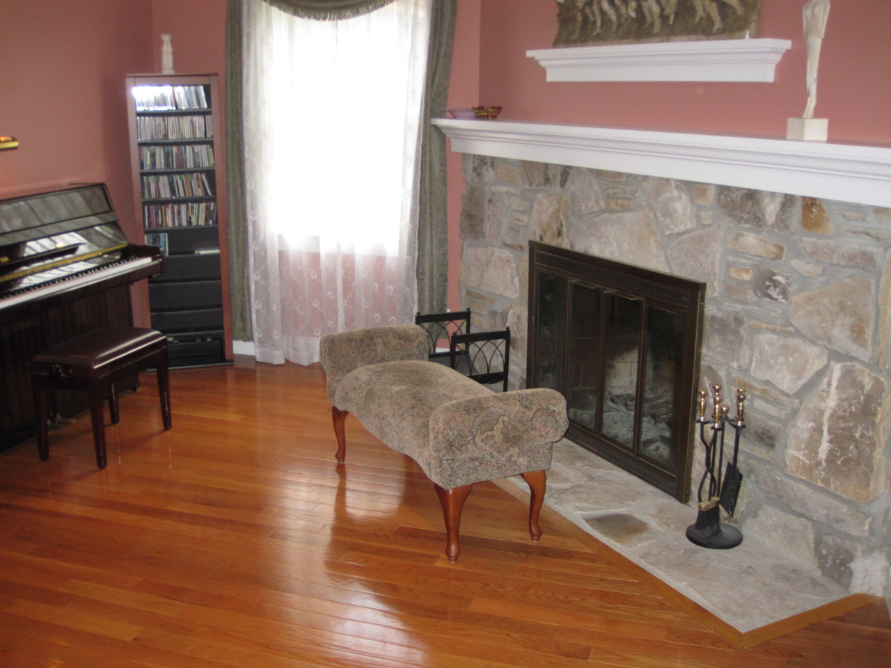614 W Road Richmond, MA 01254 - Photo 10 of 19 a living room with furniture and a fireplace