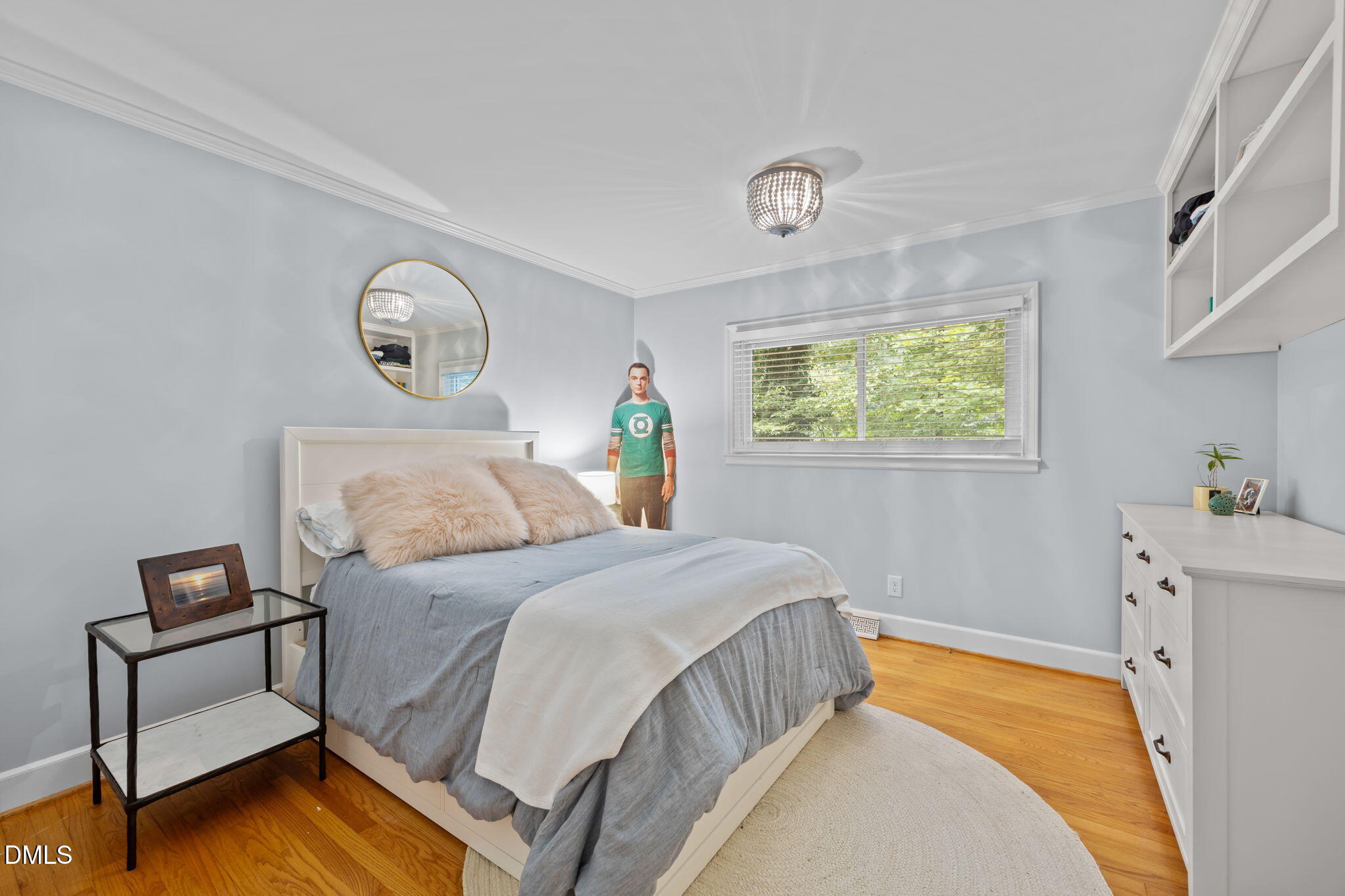 1812 Rolling Road Chapel Hill, NC 27514 - Photo 30 of 72 a bedroom with a bed and a dresser