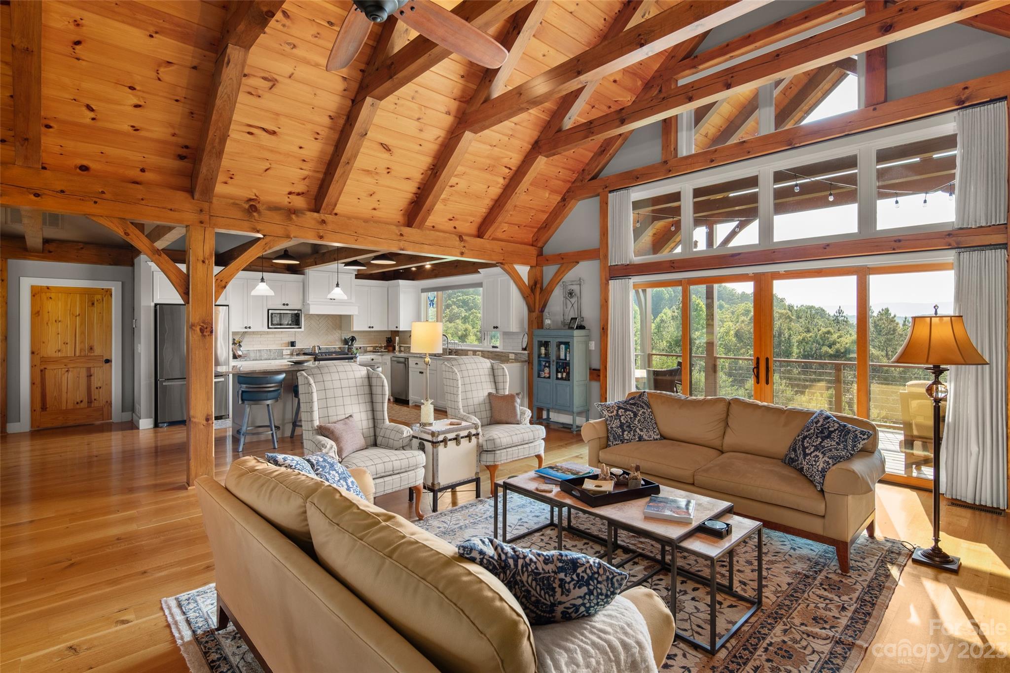 285 Red Tail Trail Mill Spring Mill Spring, NC 28756 - Photo 13 of 48 a living room with furniture and a large window