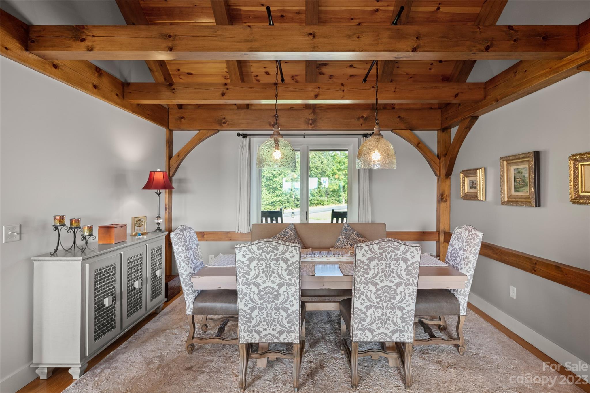 285 Red Tail Trail Mill Spring Mill Spring, NC 28756 - Photo 16 of 48 a view of a dining room with furniture window and outside view