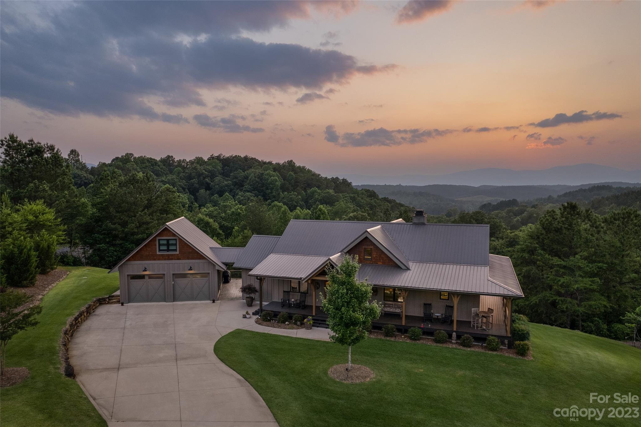285 Red Tail Trail Mill Spring Mill Spring, NC 28756 - Photo 2 of 48 an aerial view of a house with garden