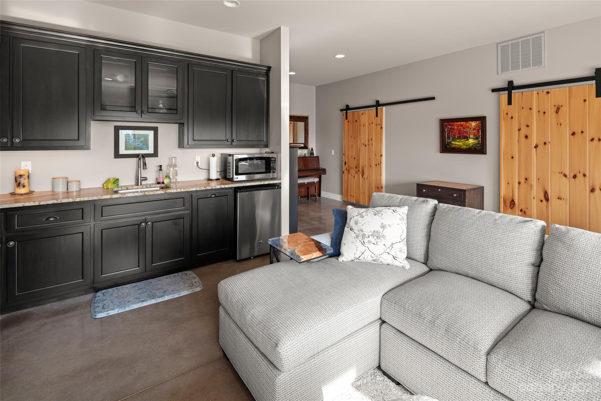 285 Red Tail Trail Mill Spring Mill Spring, NC 28756 - Photo 29 of 48 a living room with stainless steel appliances kitchen island granite countertop a refrigerator and a sink
