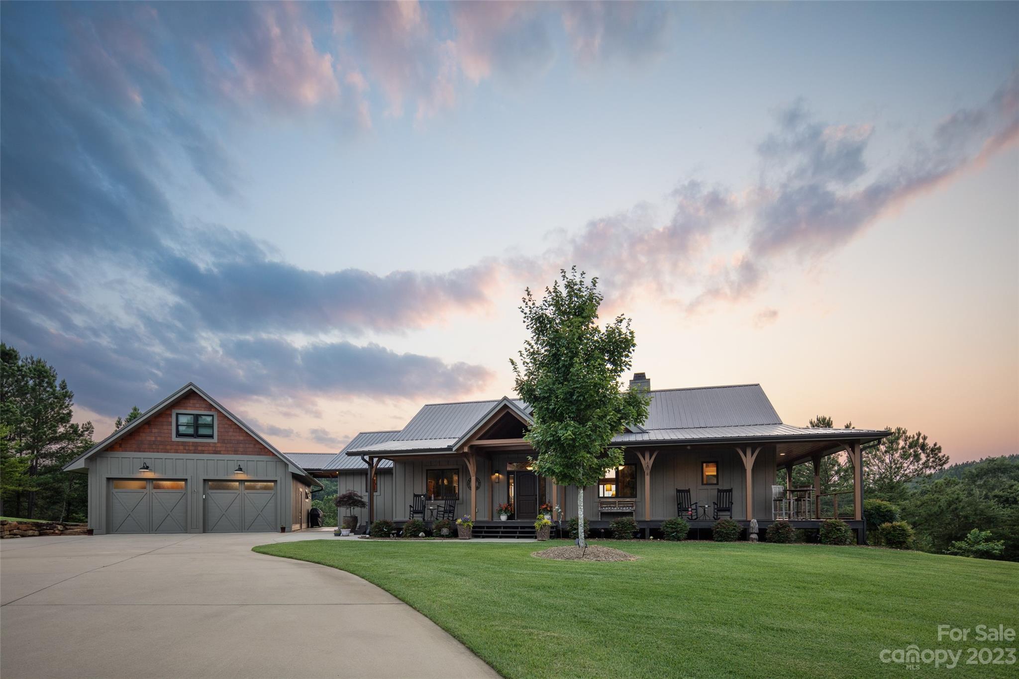 285 Red Tail Trail Mill Spring Mill Spring, NC 28756 - Photo 46 of 48 a front view of a house with garden