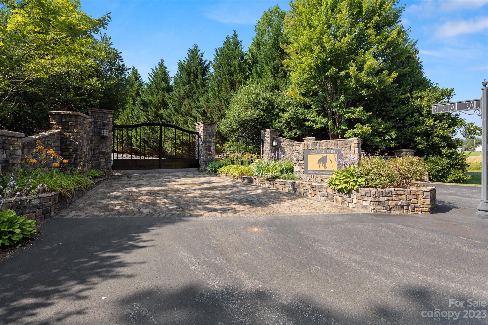 285 Red Tail Trail Mill Spring Mill Spring, NC 28756 - Photo 47 of 48 a view of a street with outdoor seating