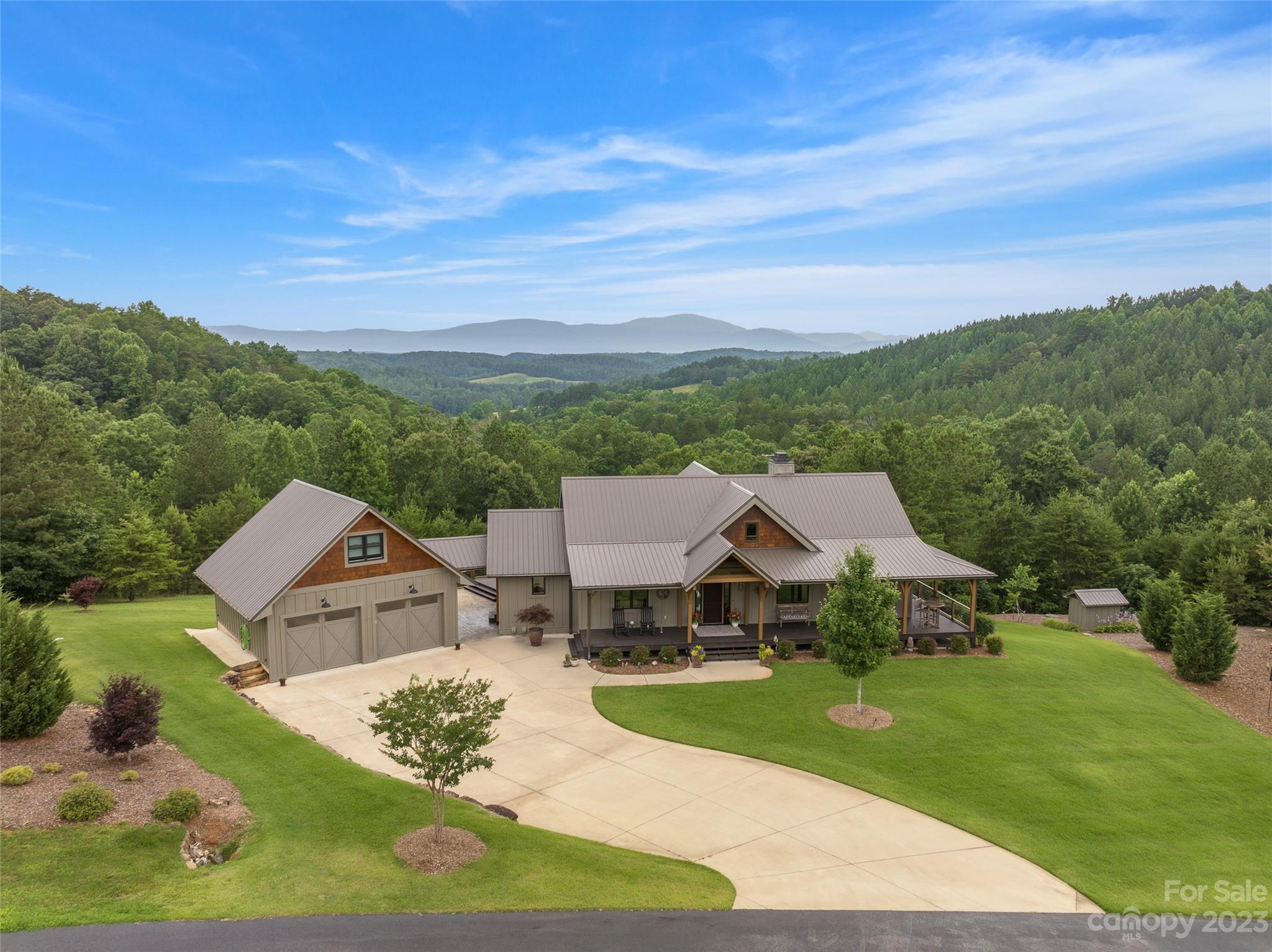 285 Red Tail Trail Mill Spring Mill Spring, NC 28756 - Photo 6 of 48 a view of a house with a yard