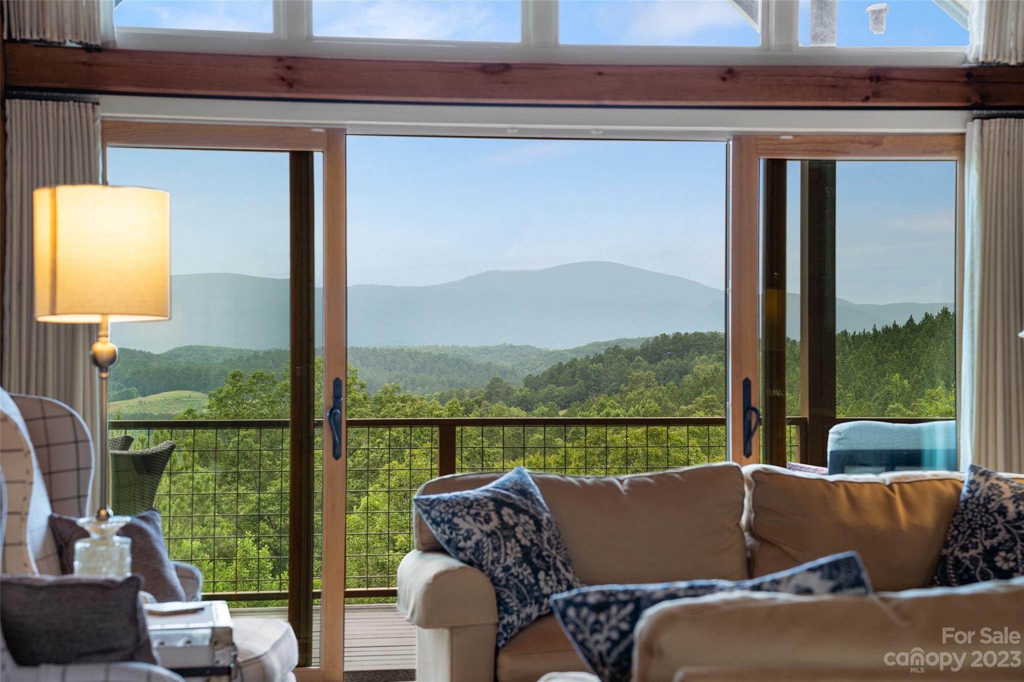285 Red Tail Trail Mill Spring Mill Spring, NC 28756 - Photo 10 of 48 a living room with a couch