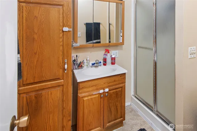 a bathroom with a sink and a mirror