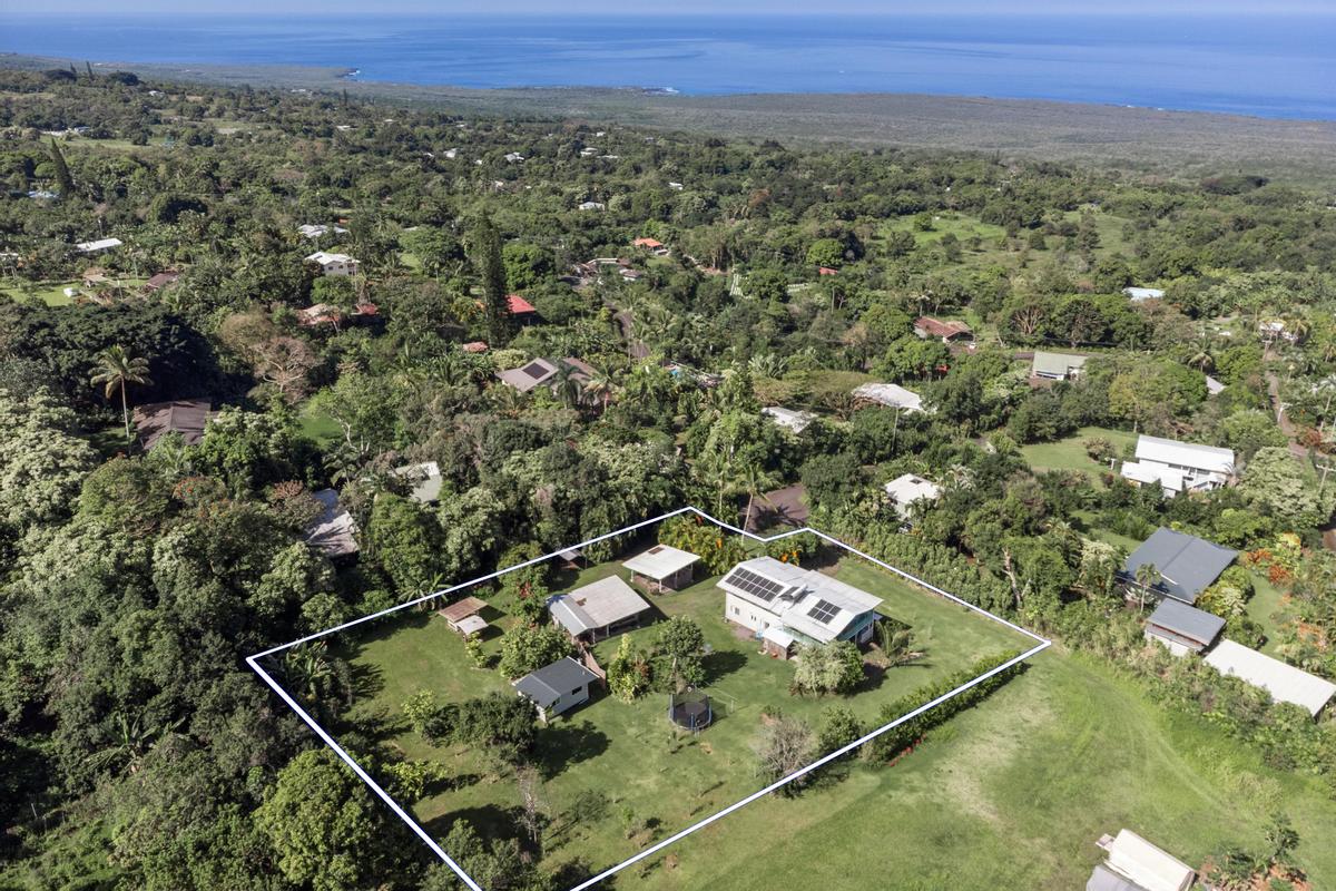 83-5434 Middle Keei Road Captain Cook, HI 96704 - Photo 6 of 30 an aerial view of residential houses with outdoor space and trees