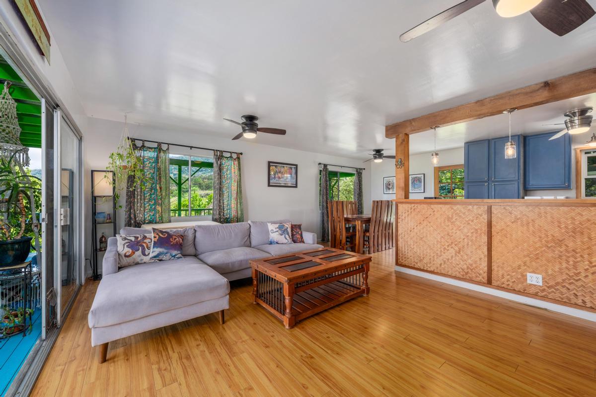 83-5434 Middle Keei Road Captain Cook, HI 96704 - Photo 9 of 30 a living room with furniture and wooden floor