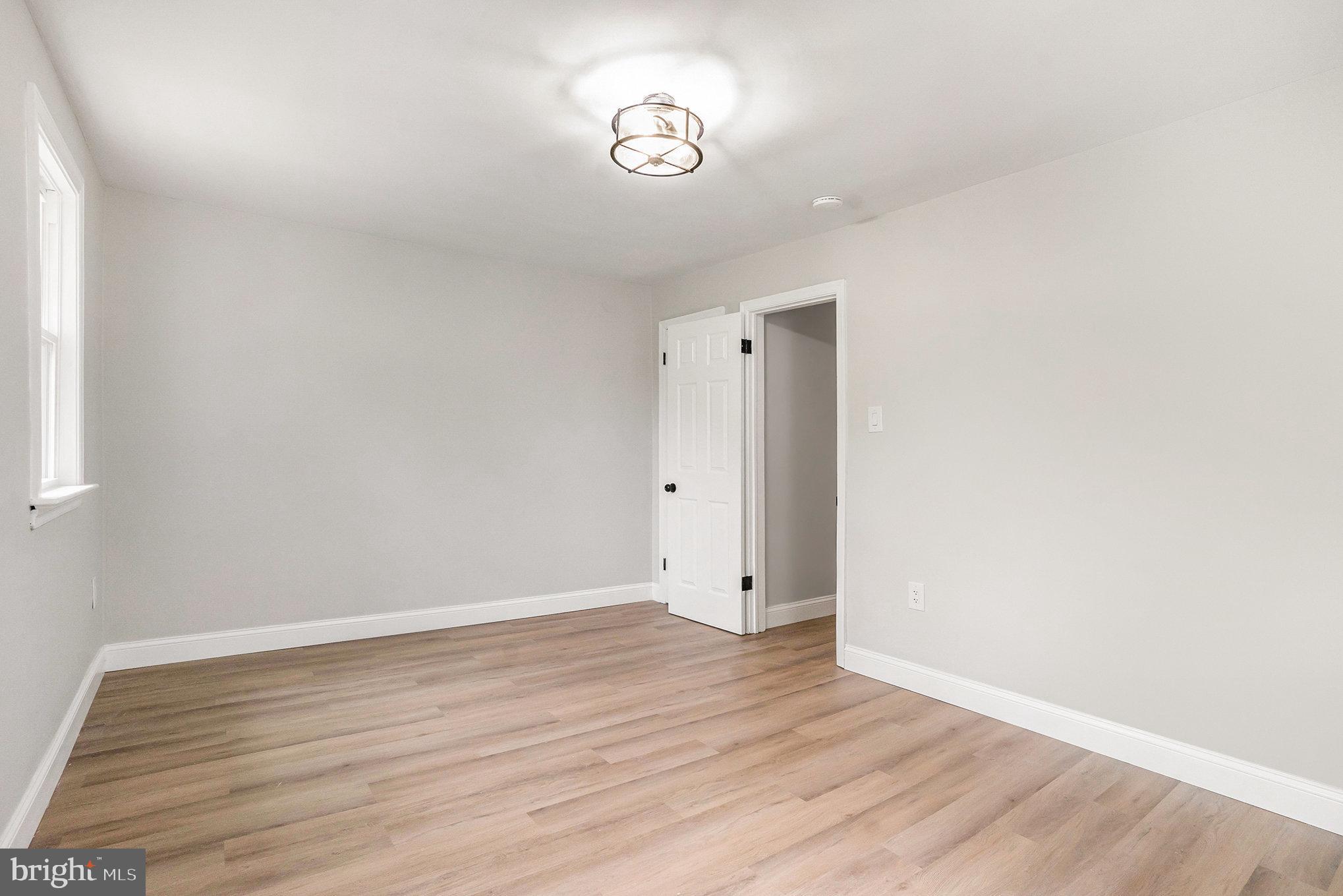 429 East 12th Avenue Conshohocken, PA 19428 - Photo 21 of 34 a view of an empty room with wooden floor