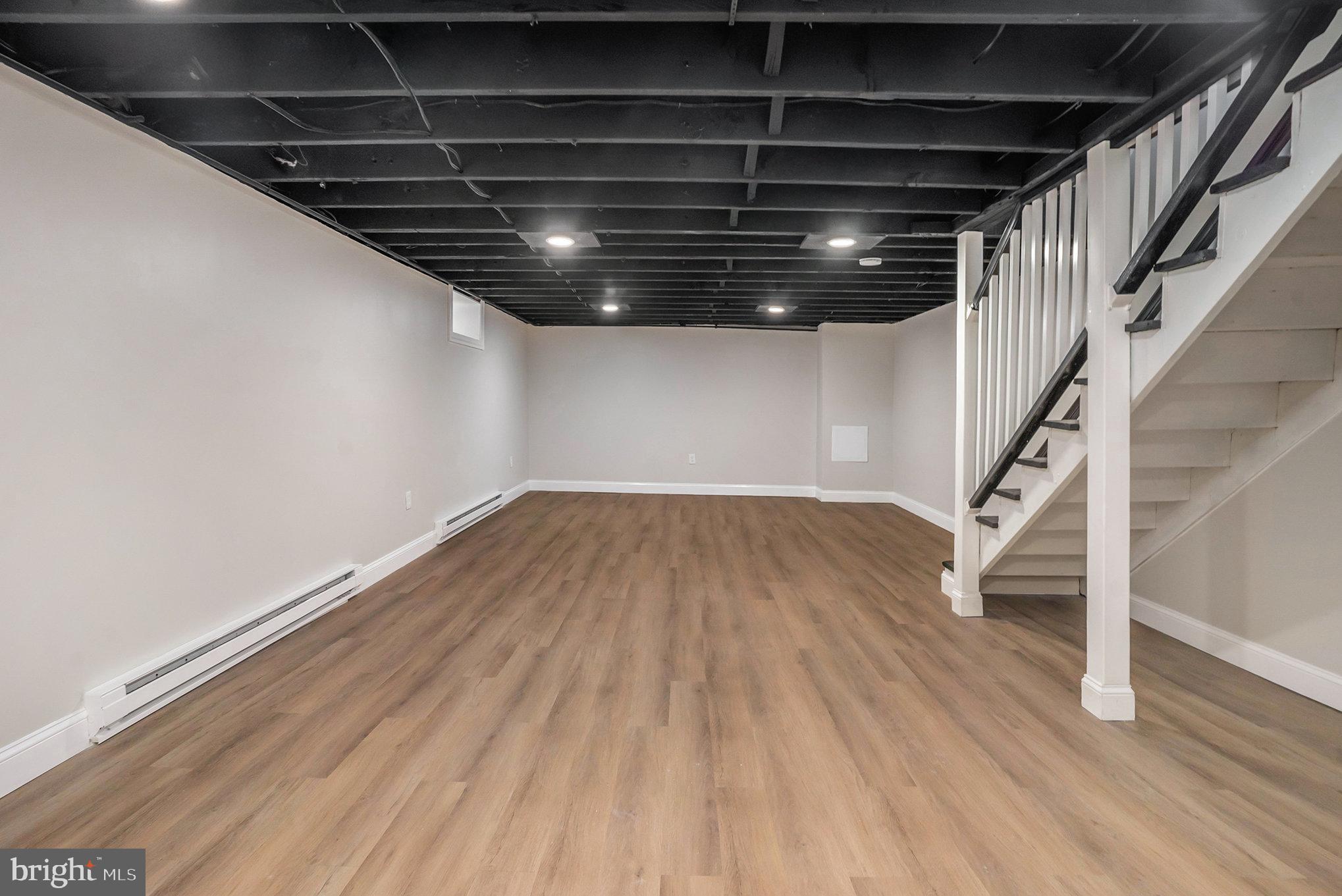 429 East 12th Avenue Conshohocken, PA 19428 - Photo 26 of 34 a view of an empty room with wooden floor