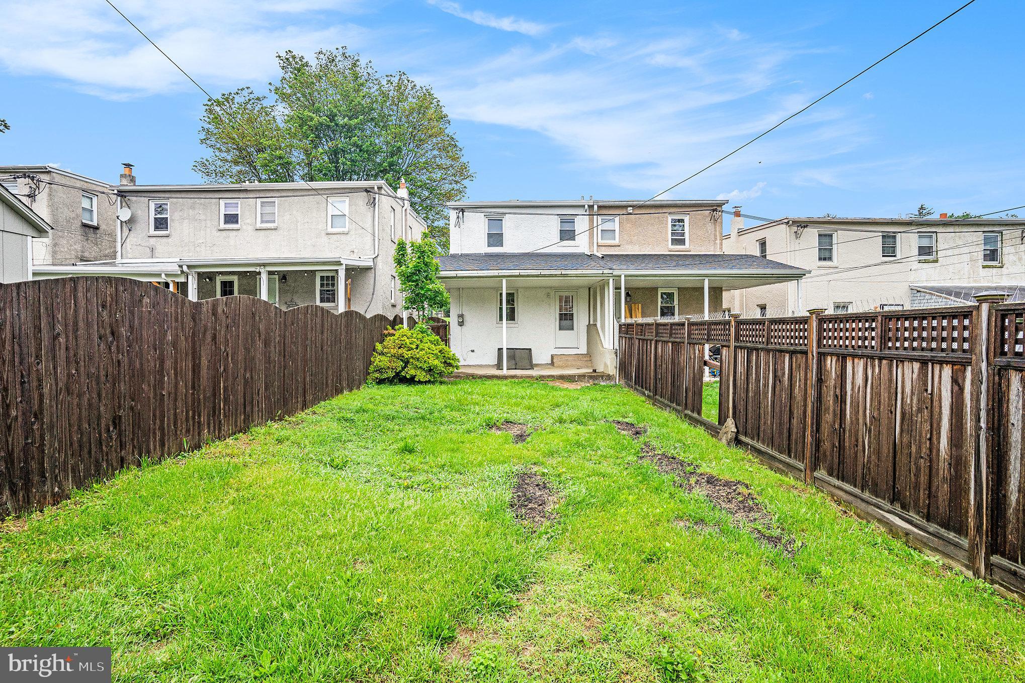 429 East 12th Avenue Conshohocken, PA 19428 - Photo 29 of 34 a view of a house with backyard and wooden fence