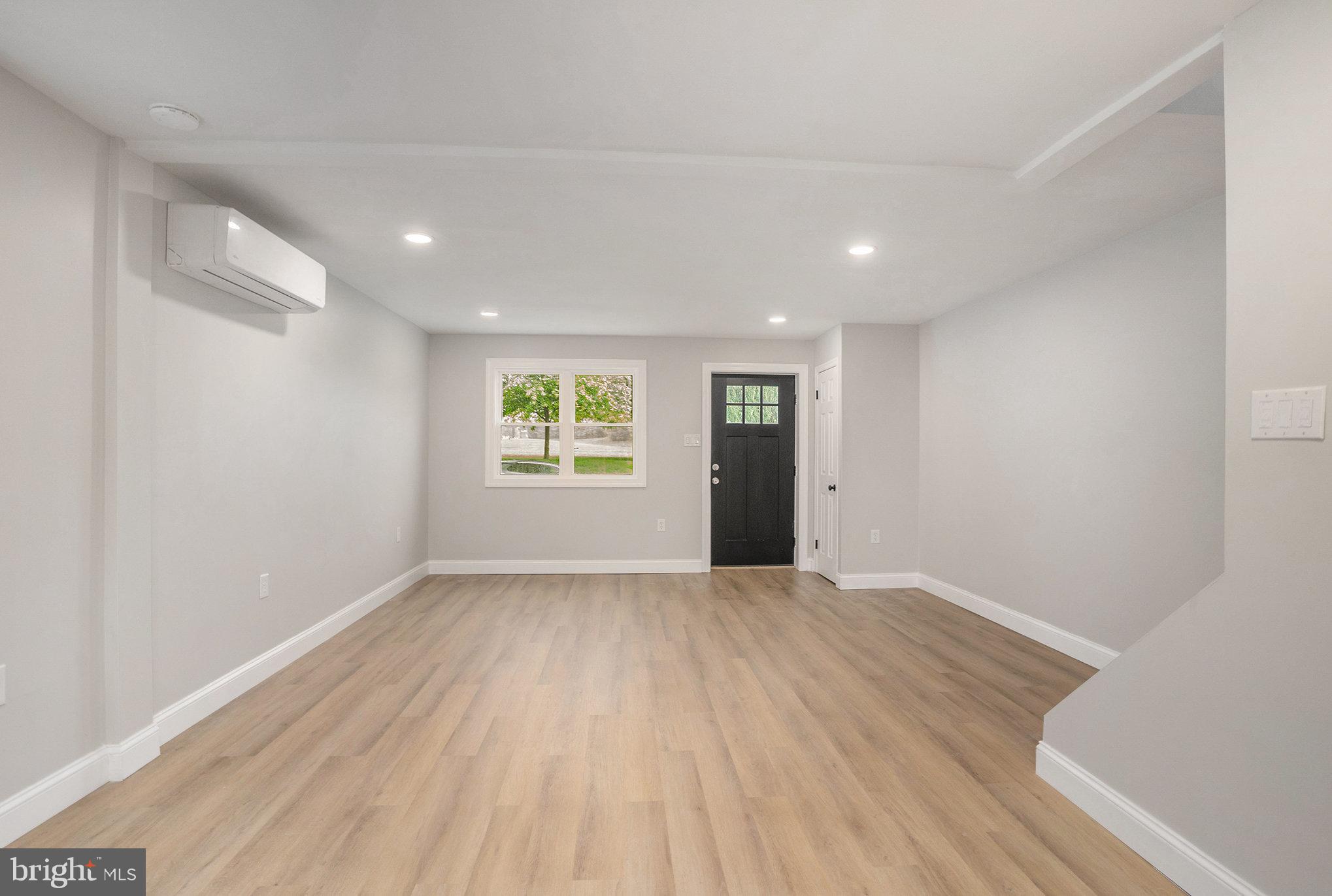 429 East 12th Avenue Conshohocken, PA 19428 - Photo 4 of 34 a view of an empty room with a window