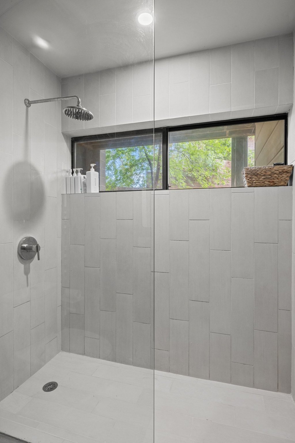 801 The High Road Austin, TX 78746 - Photo 31 of 40 a bathroom with a shower