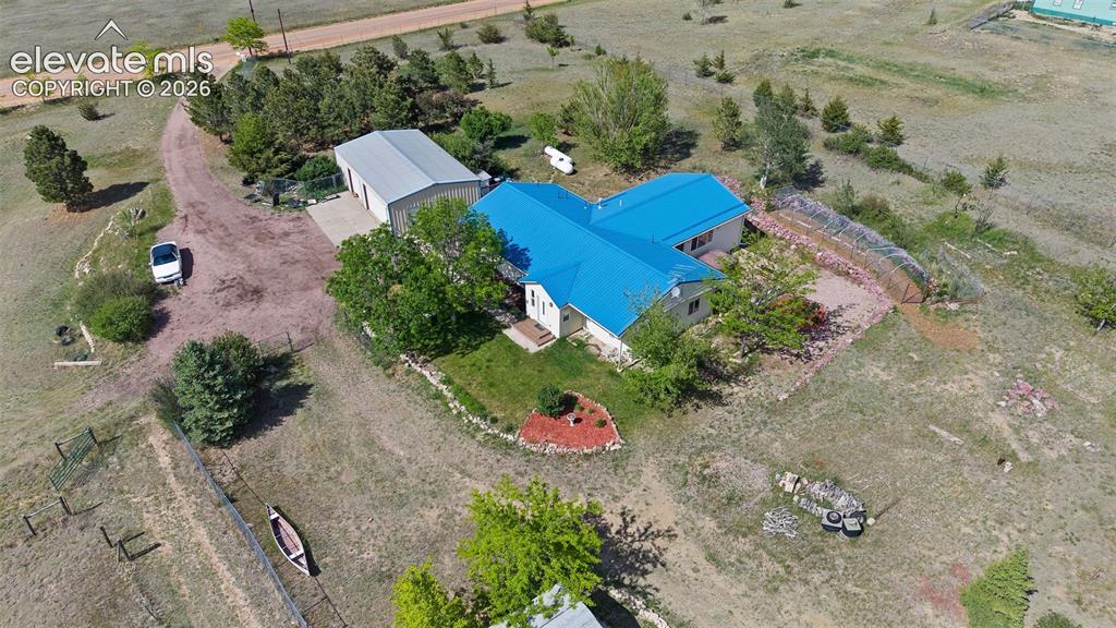 13075 Blaney Road South Peyton, CO 80831 - Photo 39 of 40 Aerial view showing main house and 4 car garage.