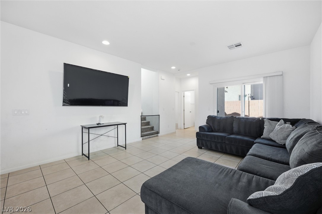 1811 Lincoln Road Las Vegas, NV 89115 - Photo 9 of 30 Living area with light tile patterned floors and recessed lighting
