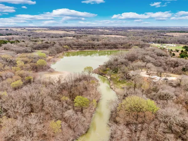 a view of a lake with a city