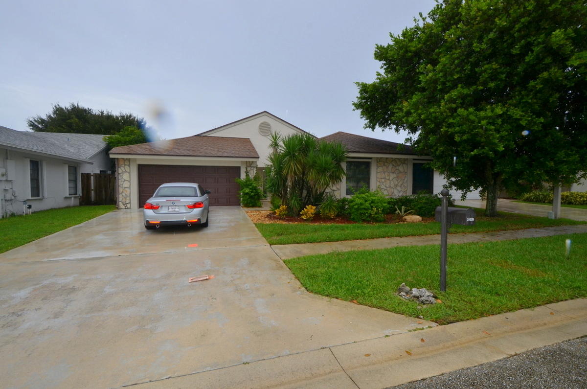 21020 Woodspring Avenue Boca Raton, FL 33428 - Photo 1 of 6 Front