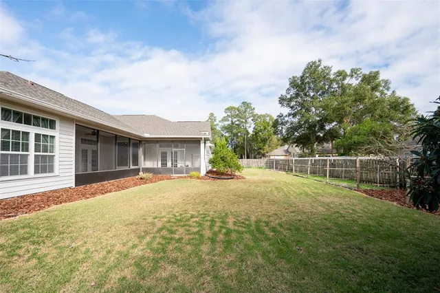 a house with trees in the background