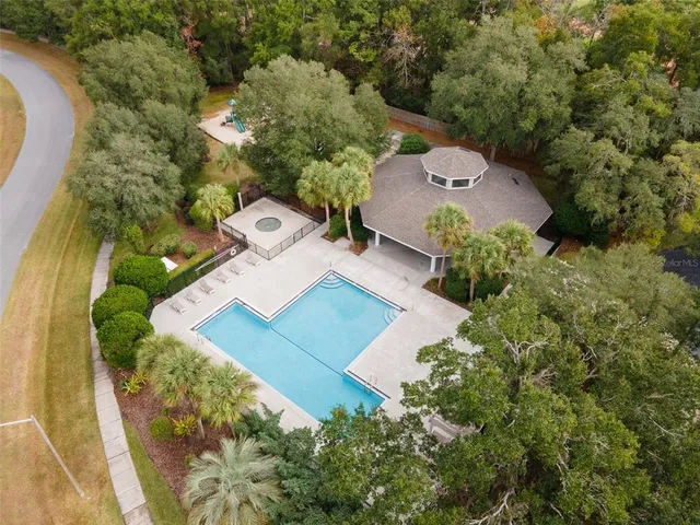 an aerial view of a house with a garden
