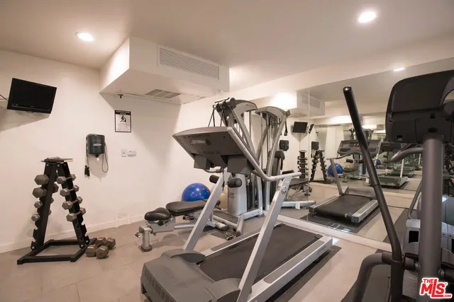a view of a room with gym equipment