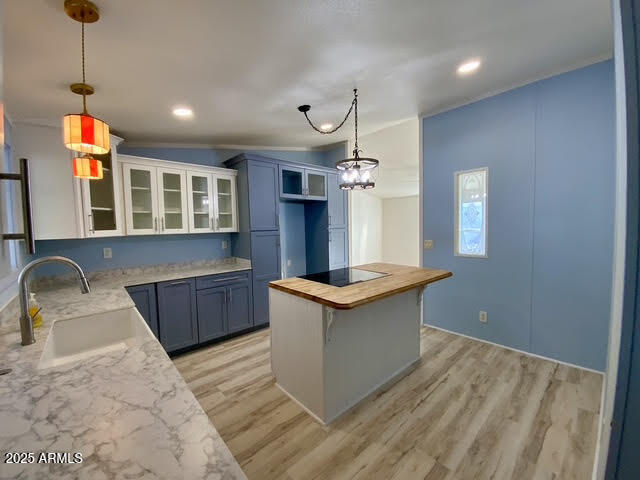 723 Finnie Flat Road, Unit 132 Camp Verde, AZ 86322 - Photo 16 of 58 a kitchen with granite countertop a sink and a stove
