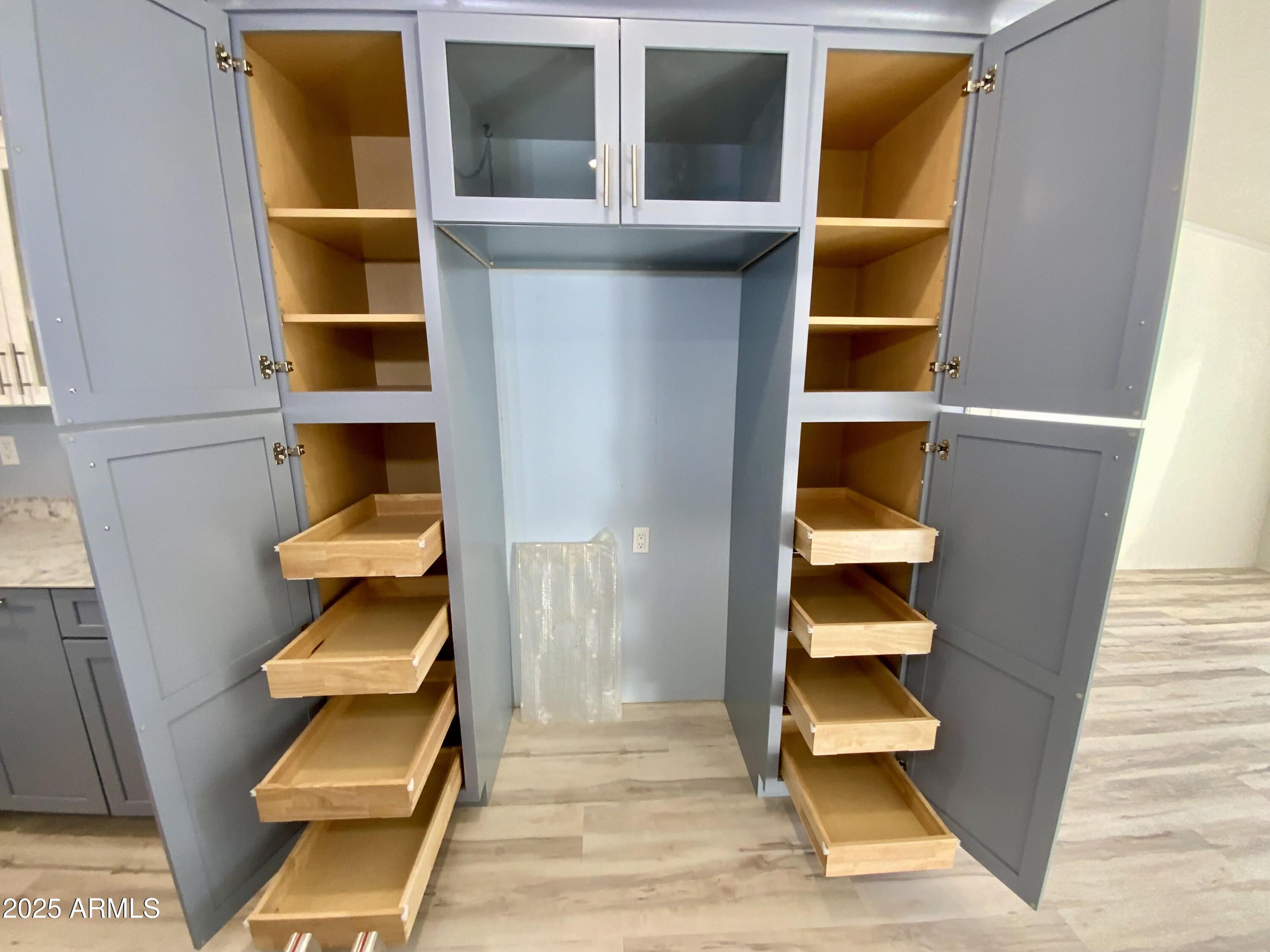 723 Finnie Flat Road, Unit 132 Camp Verde, AZ 86322 - Photo 25 of 58 a view of walk in closet with wooden floor